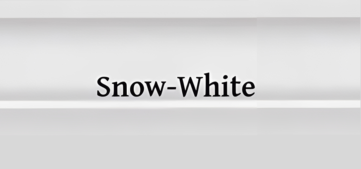 A close-up of a printed page showing the word 'Snow-White'.